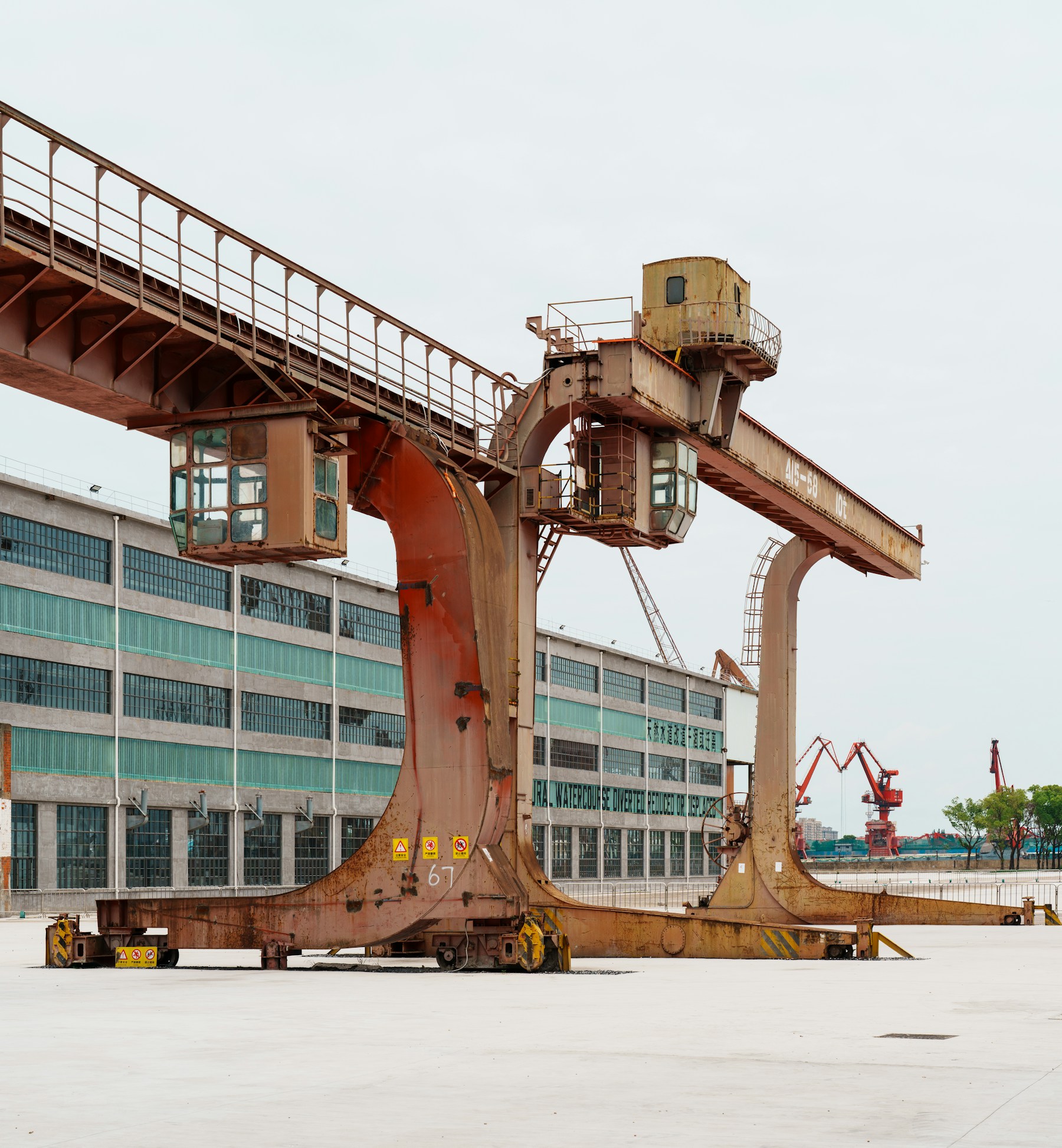Gantry cranes beside an industrial building in Yangpu, Shanghai